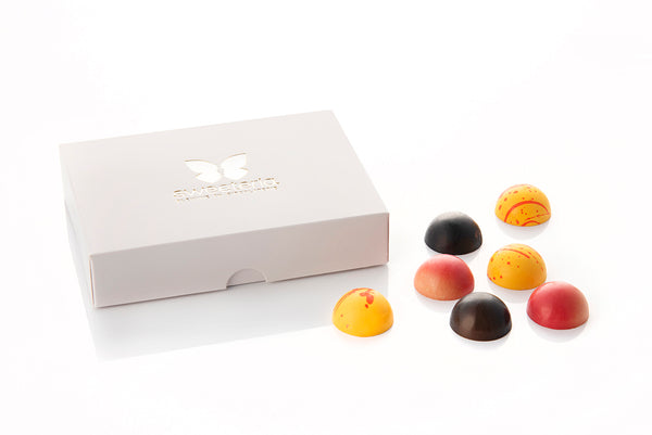 Praline artizanale de ciocolata alba si cu lapte, fara zahar